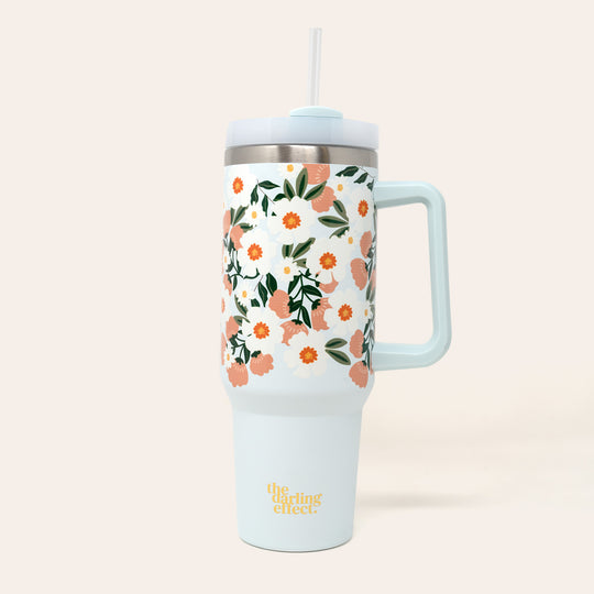 flower talk take me everywhere tumbler is light blue with white and blush flowers