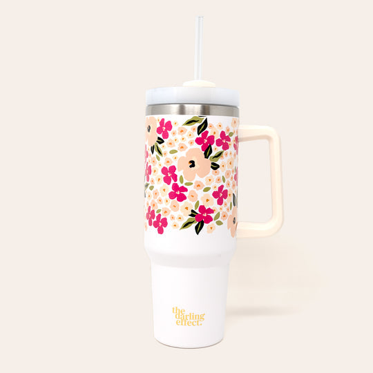 lively floral take me everywhere tumbler is white with hot pink and light pink flowers all over