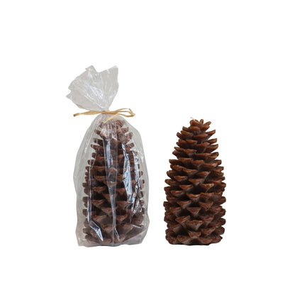 pine cone shaped candles, one in bag one out of bag.