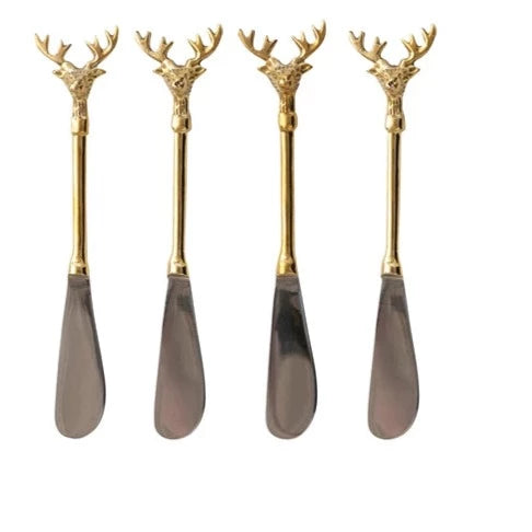 4 stainless steel spreaders with brass handles with a deer head with antlers on the end.