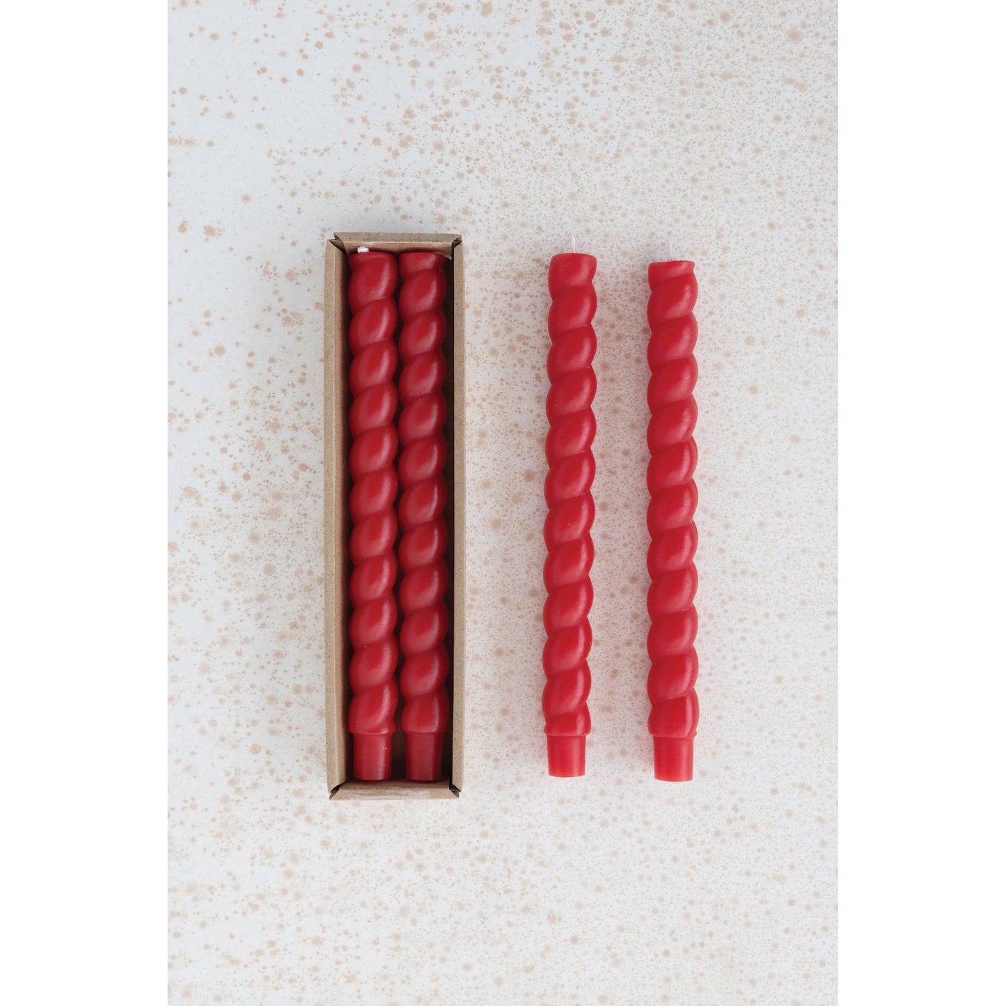red taper candles with a twisted design.