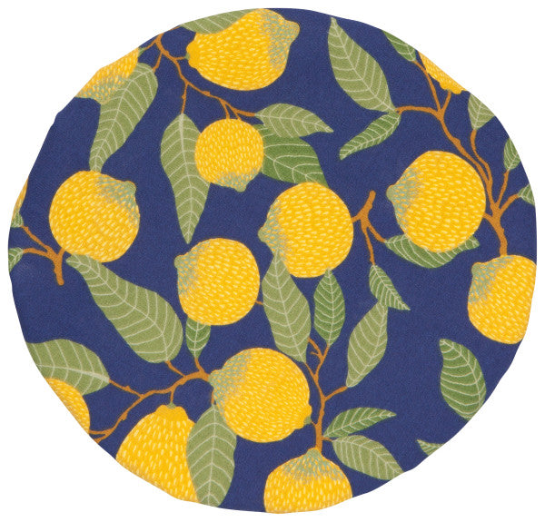 top view of bowl cover that is blue with yellow lemons and green leaves.