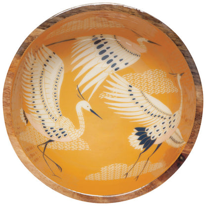 large bowl with yellow interior and crane and cloud design.